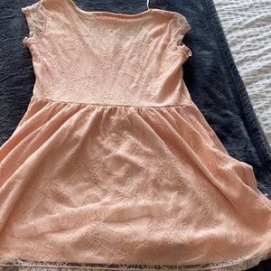 Fun, flirty, cheerful peach lace dress, from Simon’s dress department!